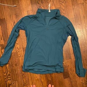 Lululemon size 10 quarter zip. Light breathable material. Great blue color.